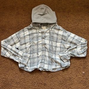 This is a small cropped flannel hoodie from American Eagle